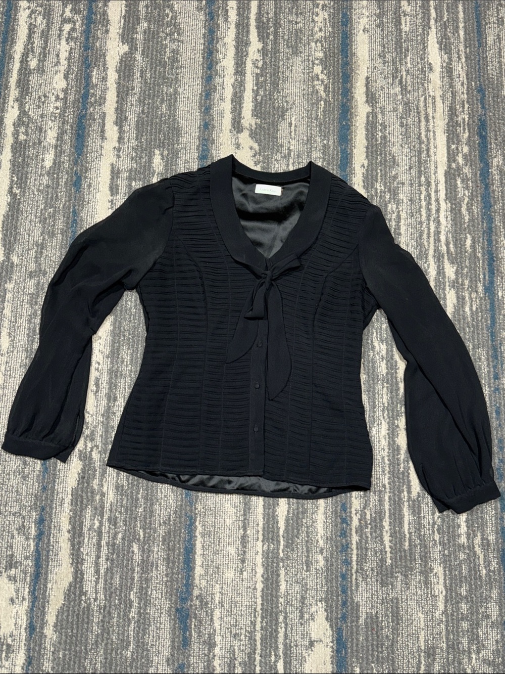 Size Small Calvin Klein Black Tie-Neck Blouse. Measure 16in pit to pit